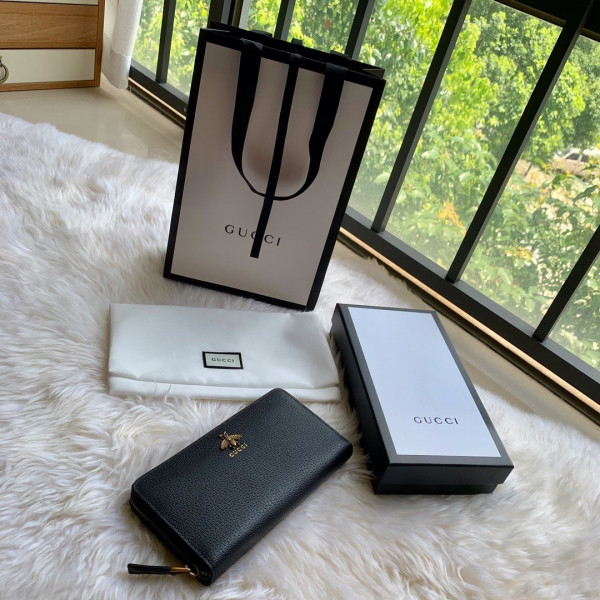 G*u*i leather zip around wallet