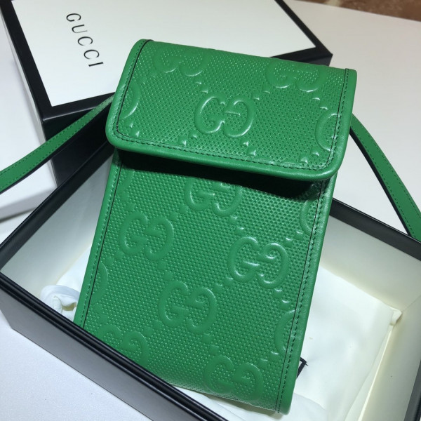 G*u*i gg embossed mini bag