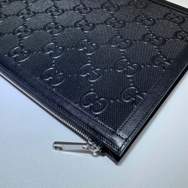 G*u*i gg embossed pouch