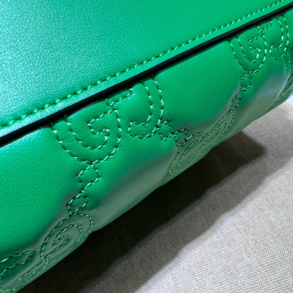 G*u*i gg matelassé leather top handle bag