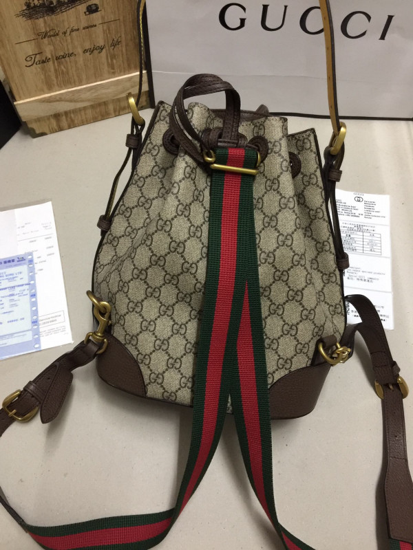 G*u*i bucket bag