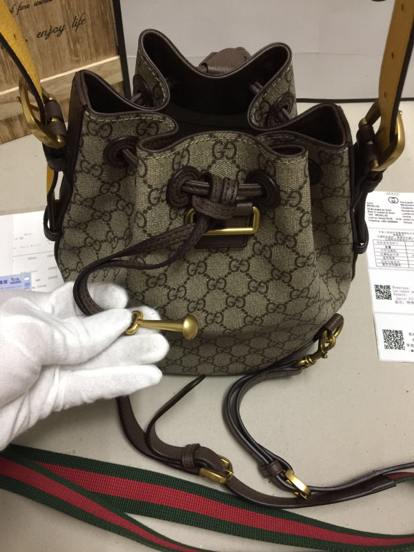 G*u*i bucket bag