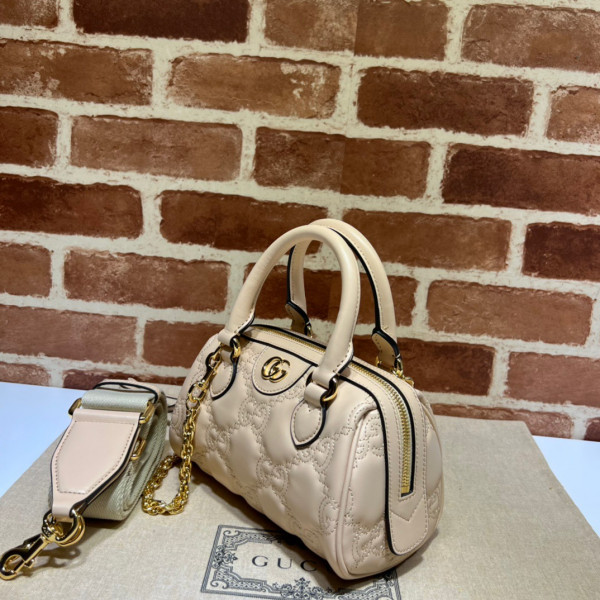 G*u*i gg matelassé leather top handle bag