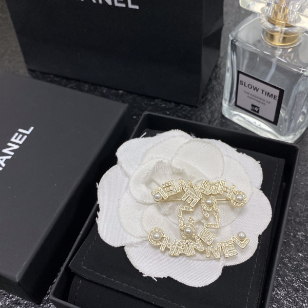 CL BROOCH