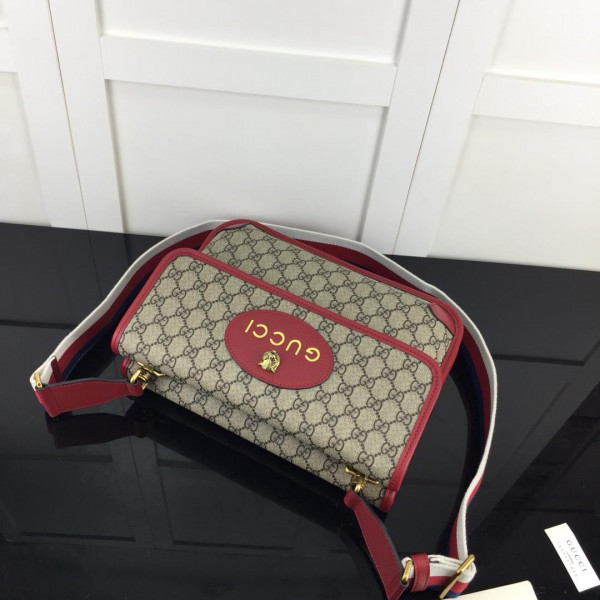 G*u*i gg messenger bag