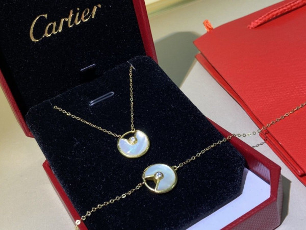 Ca*t*er  amulet necklace