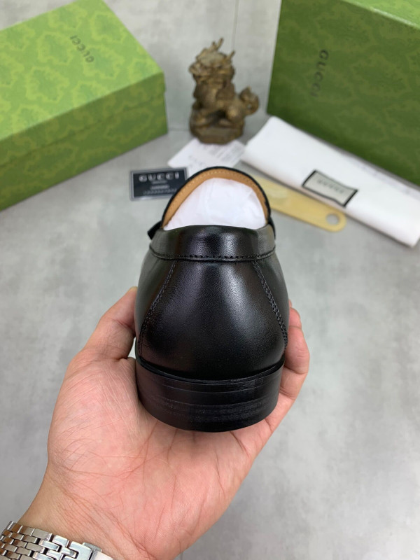 G*u*i loafers