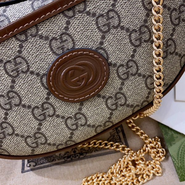 G*u*i half-moon-shaped mini bag with interlocking g