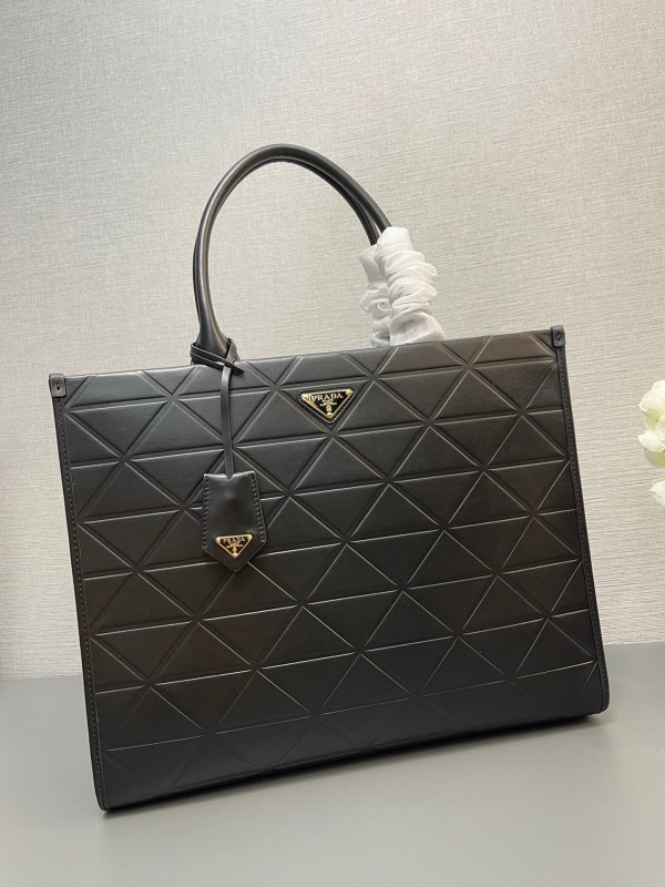 Pra*a symbole large leather bag $ 4,200