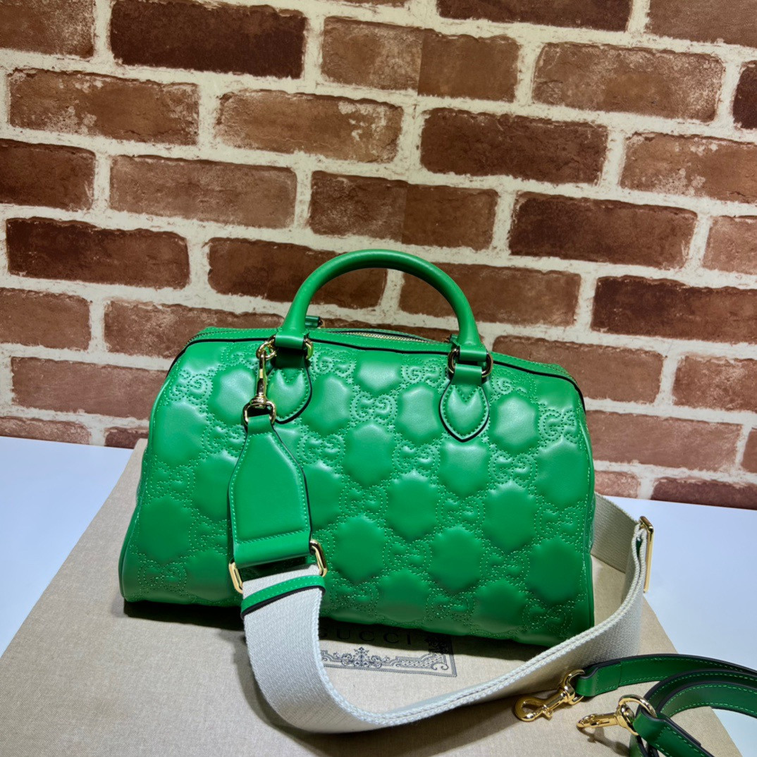 G*u*i gg matelassé leather top handle bag