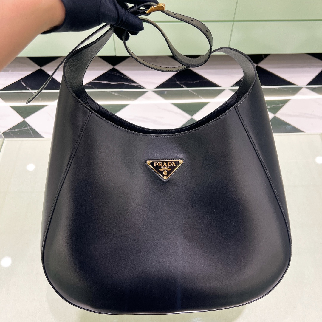 Pra*a large leather shoulder bag with topstitching