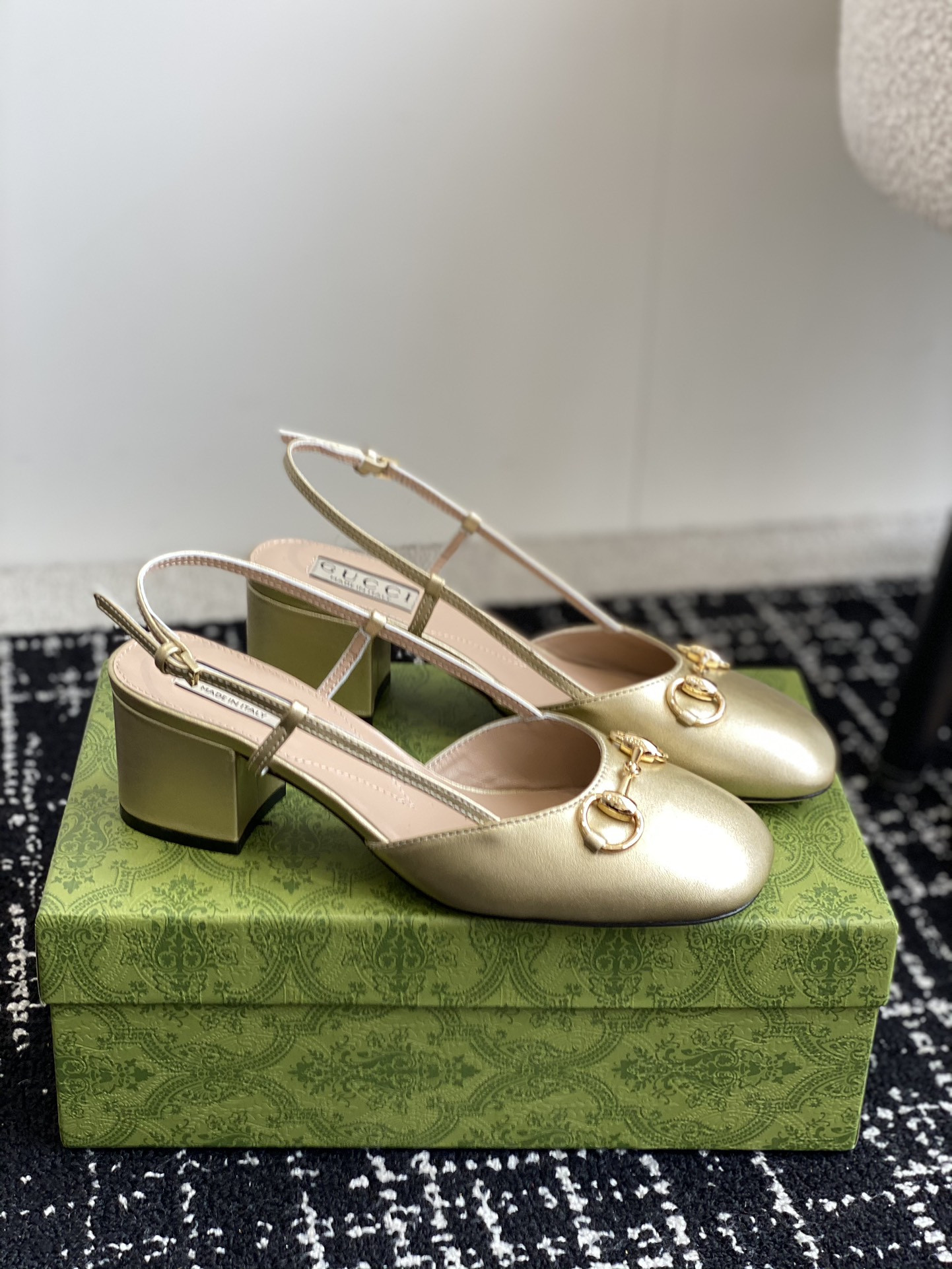 G*u*i women's horsebit slingback